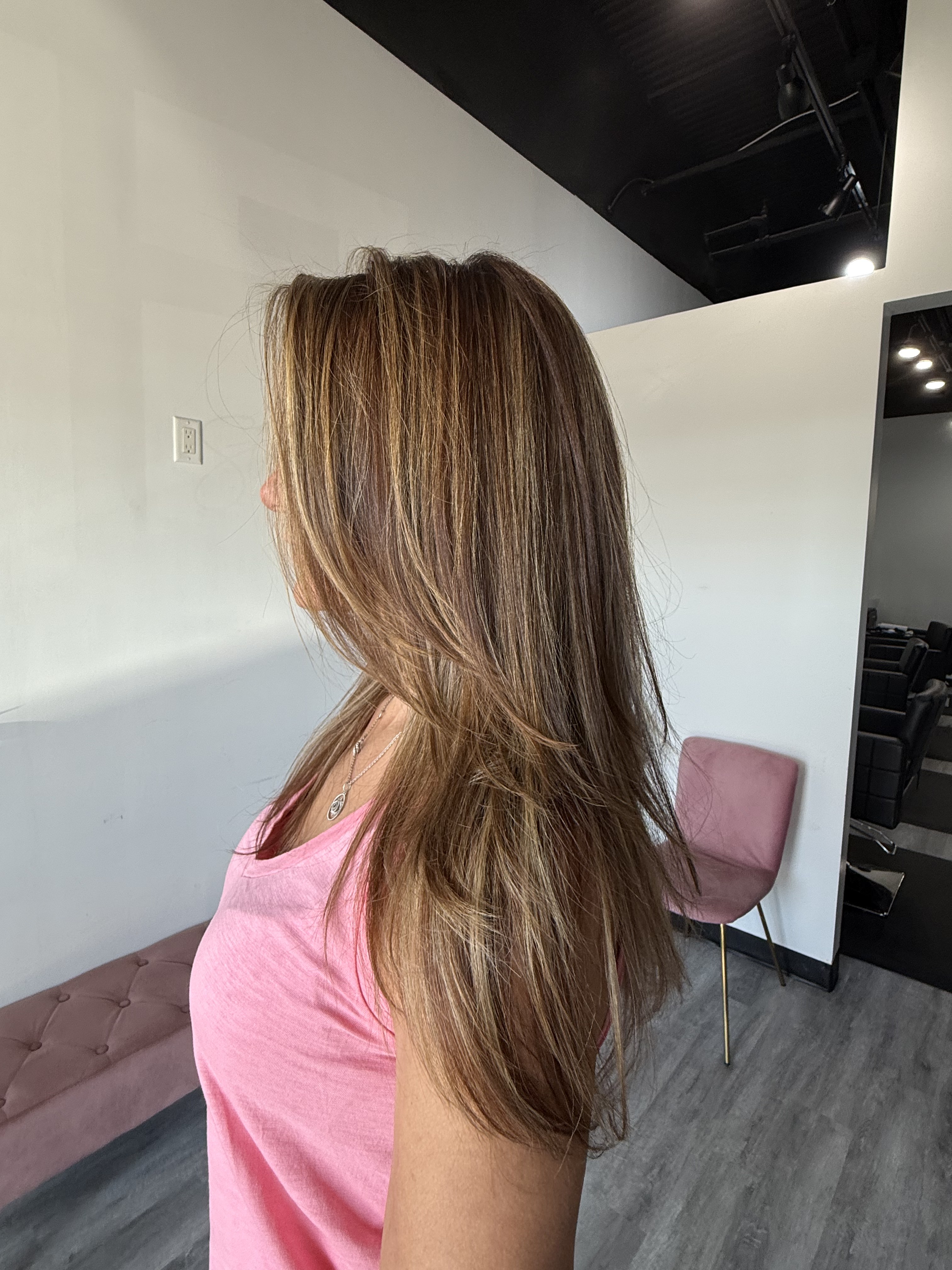 Long layered bronde with buttery blonde highlights and sleek face-framing pieces